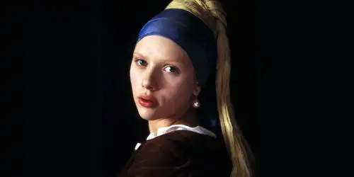 电影戴珍珠耳环的少女将瞬间的光影转化为永恒的精神符号
