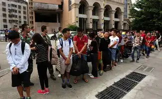 26名越南偷渡者蜗居深圳小屋中国工资高
