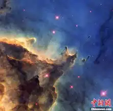 组图nasa发布猴头星云绚丽组照为哈勃望远镜24岁庆生
