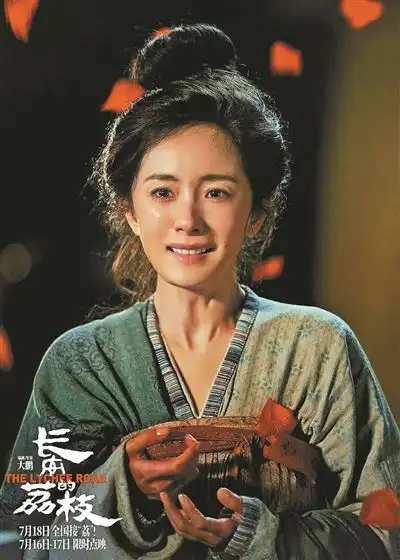 从一骑红尘妃子笑的荒诞到一骑红花妻子笑的浪漫
