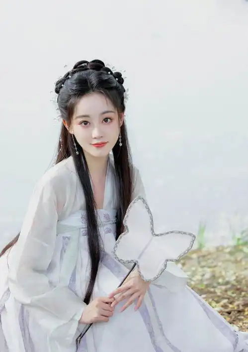 女星祝绪丹时尚造型娇艳如花窈窕淑女