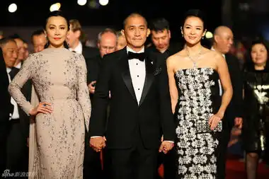 组图梁朝伟红毯同牵刘嘉玲章子怡