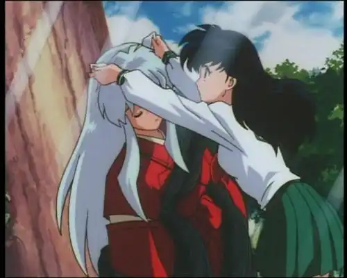 犬夜叉和戈薇在树下相遇的图片