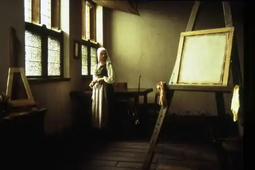 画外因维米尔笔下怯怯凝视着的女孩,是否真嫁了个屠户