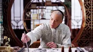 张馨予穿红色卫衣帽子遮头低调十足
