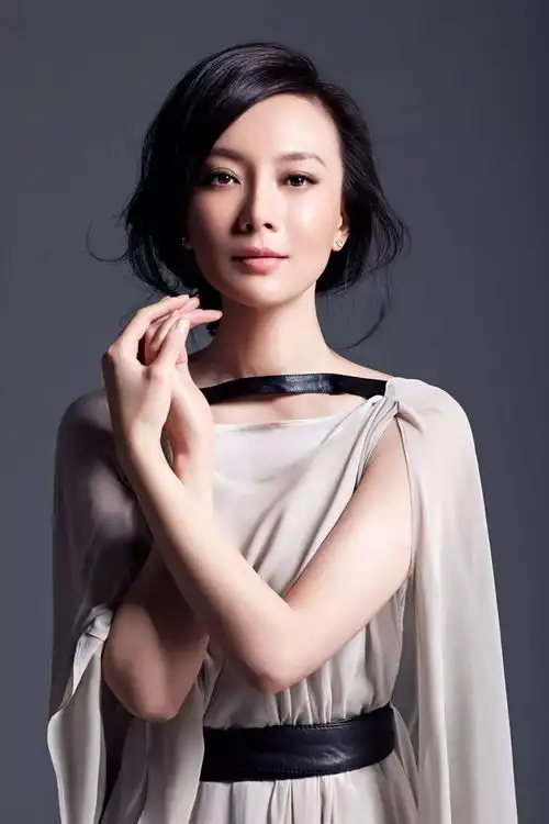 她是白玉兰华鼎双料视后,四十岁如少女般动人的旗袍女王
